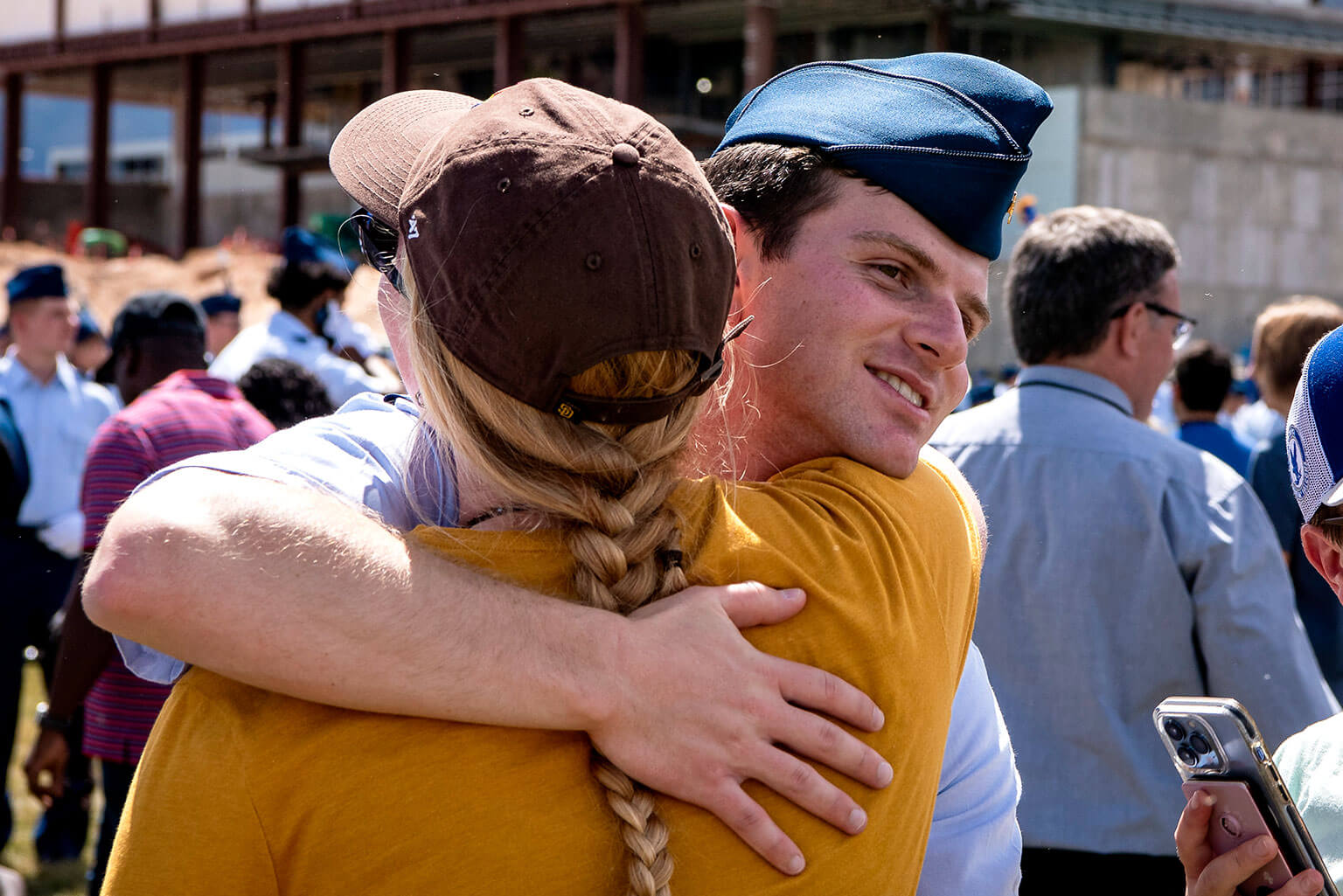 Cadet hugging sponsor.