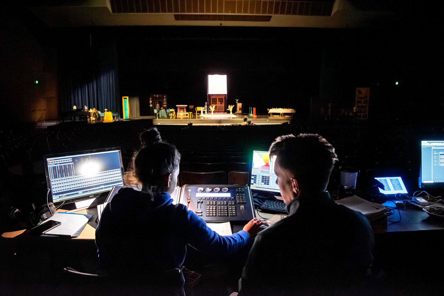 Cadets using a control board during a Bluebards production at Arnold Theater.