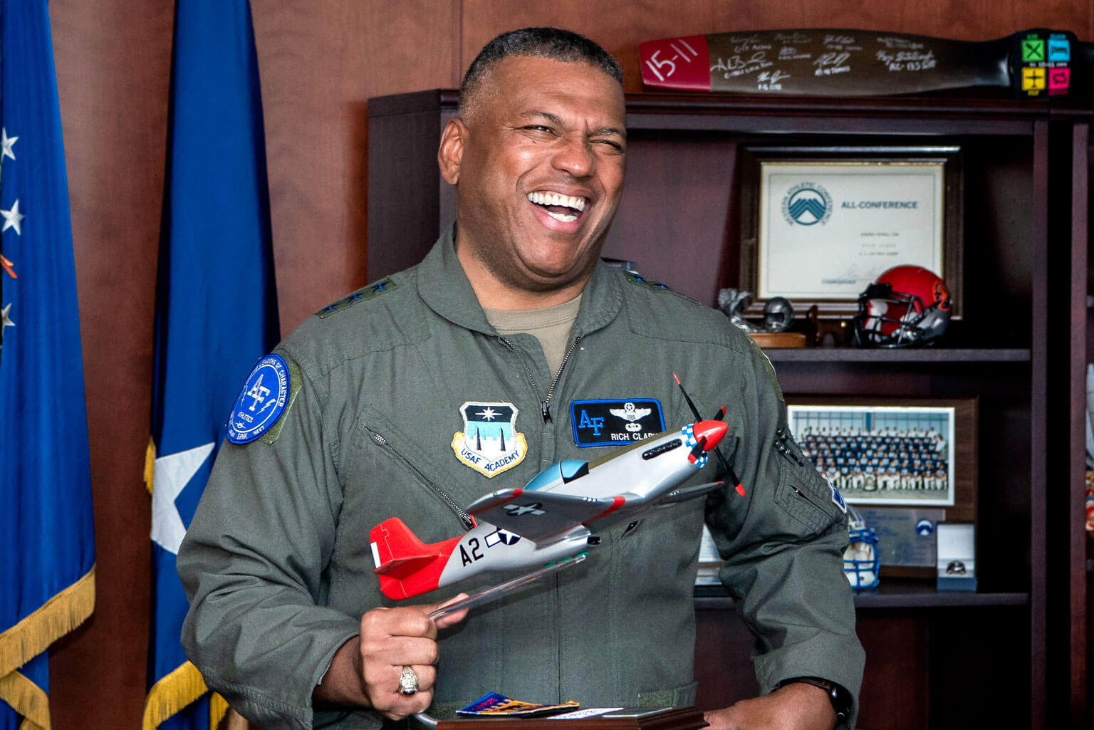 U.S. Air Force Academy Superintendent Lt. Gen. Richard Clark displays his replica of the P-51 Mustang in his office.