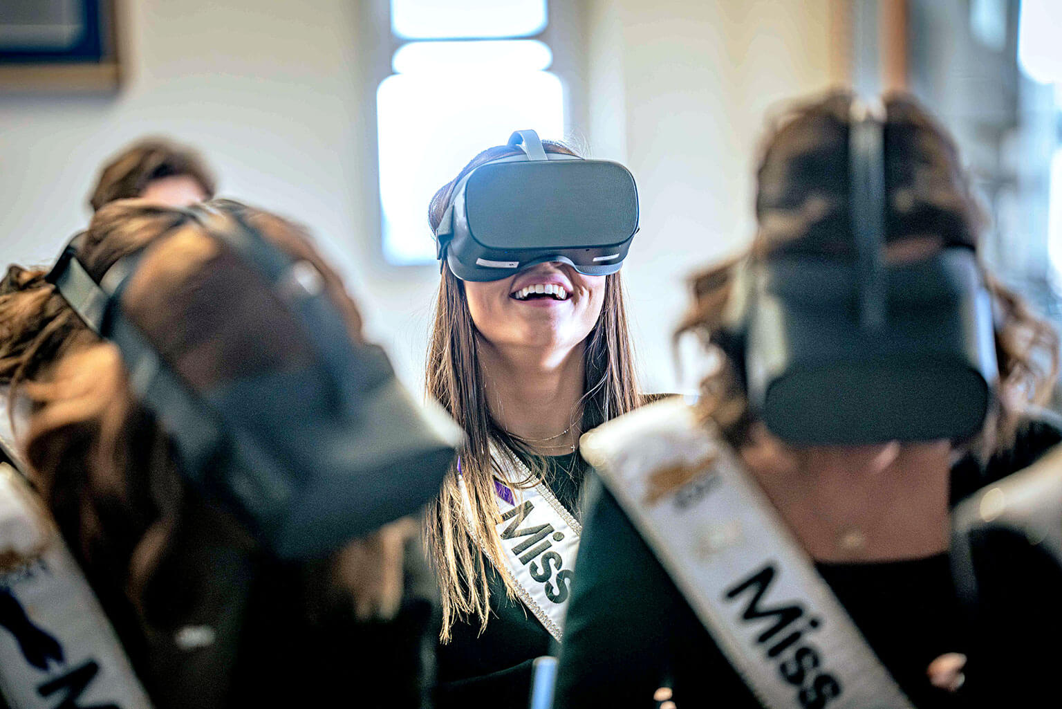 2024 Miss Colorado Sarah Swift tests virtual-reality goggles in the Multi-Domain Laboratory