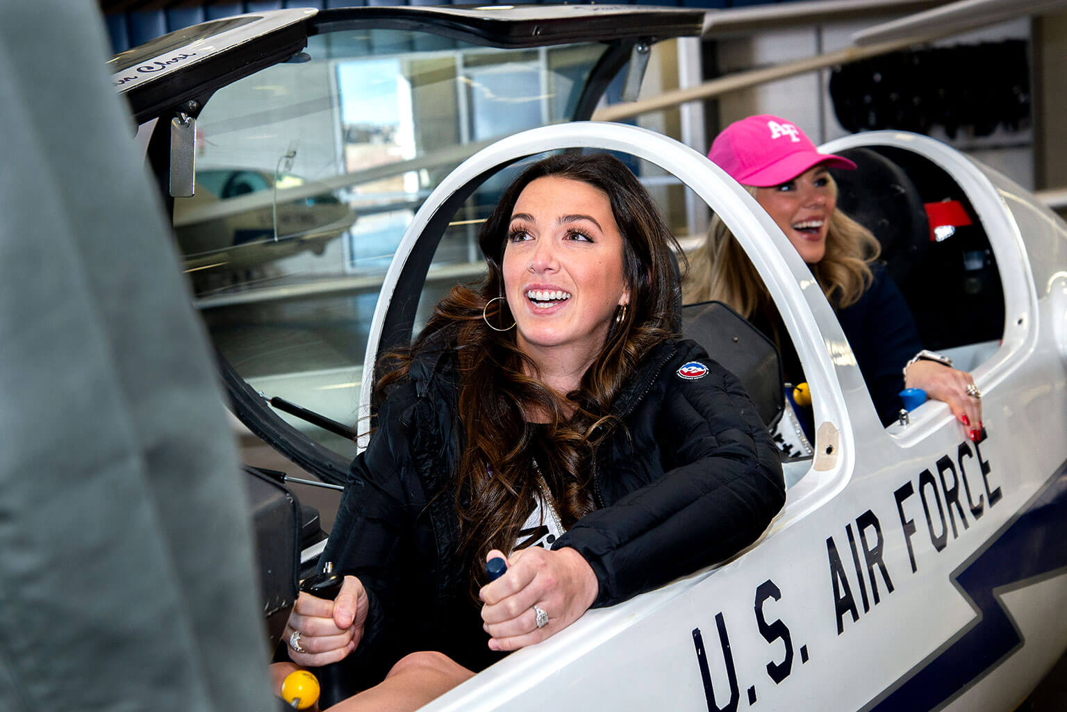 Miss Delaware Emily Beale checks out the TG-16A Glider during the Miss America Delegation’s tour of Davis Airfield.