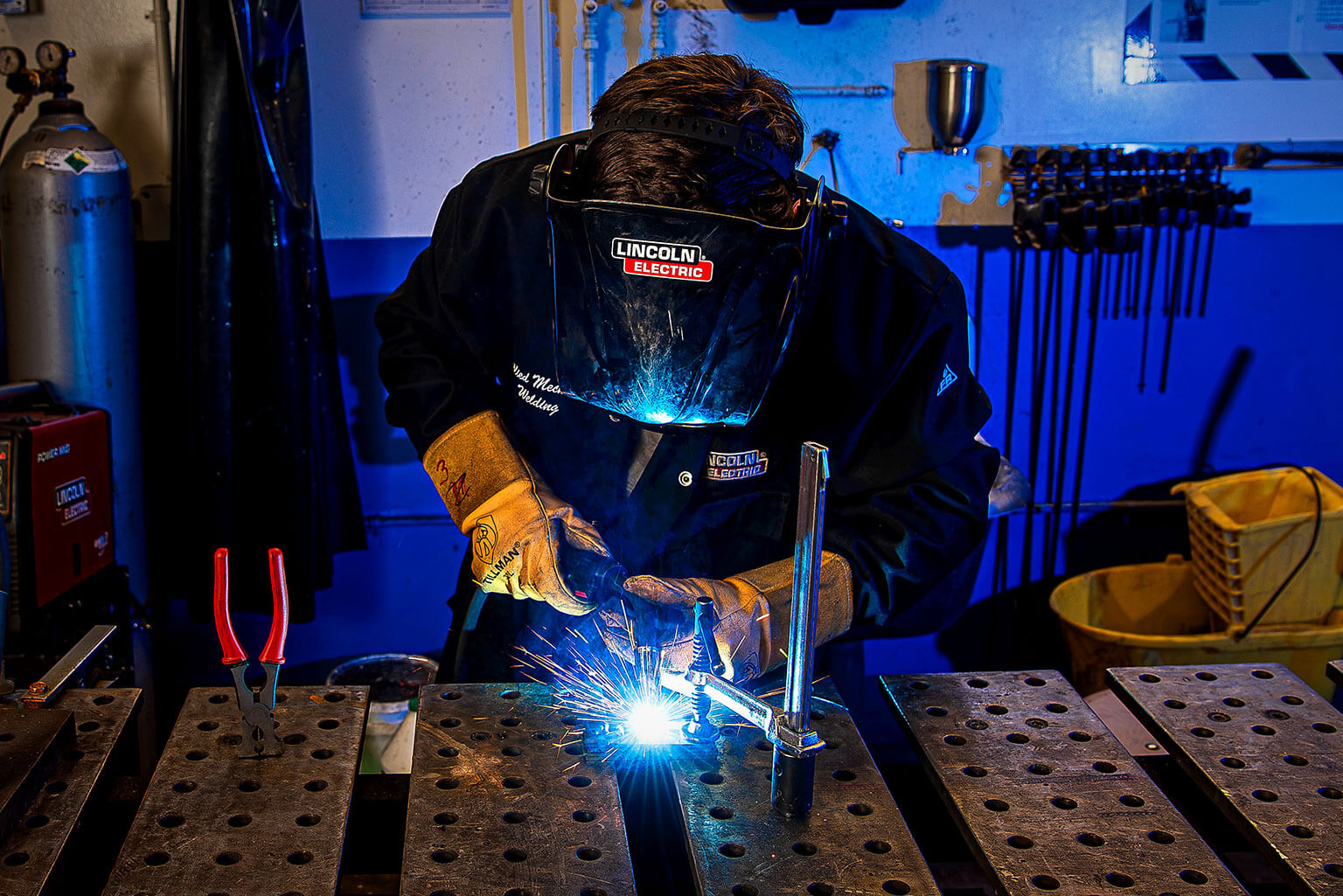 Cadet 1st Class Colton O’Dell works on the knife he made for the 2024 Minerals, Metals and Materials Society Bladesmithing Competition.