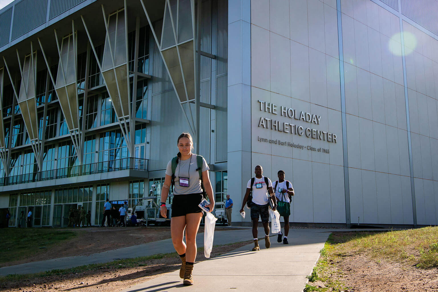 A female appointee and two male appointees leave the Holaday Athletic Center. A female appointee and two male appointees leave the Holaday Athletic Center.