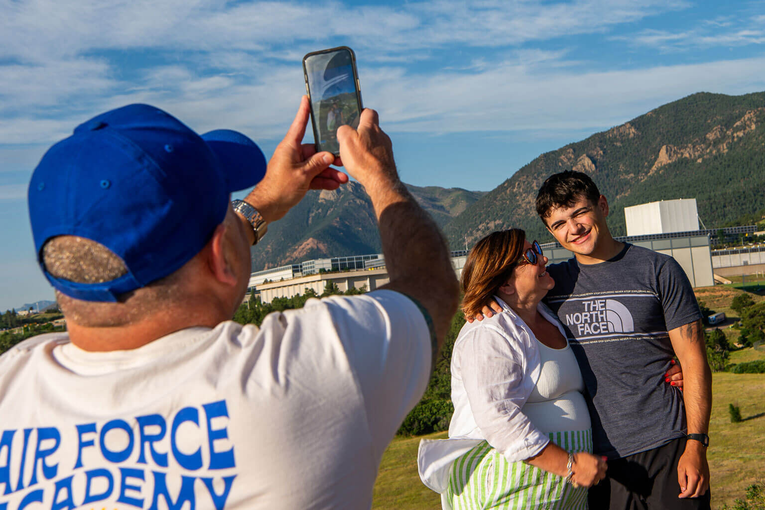U.S. Air Force Academy appointee taking photos with family members before being dropped off at the Holaday Athletic Center for In-processing Day. U.S. Air Force Academy appointee taking photos with family members before being dropped off at the Holaday Athletic Center for In-processing Day.
