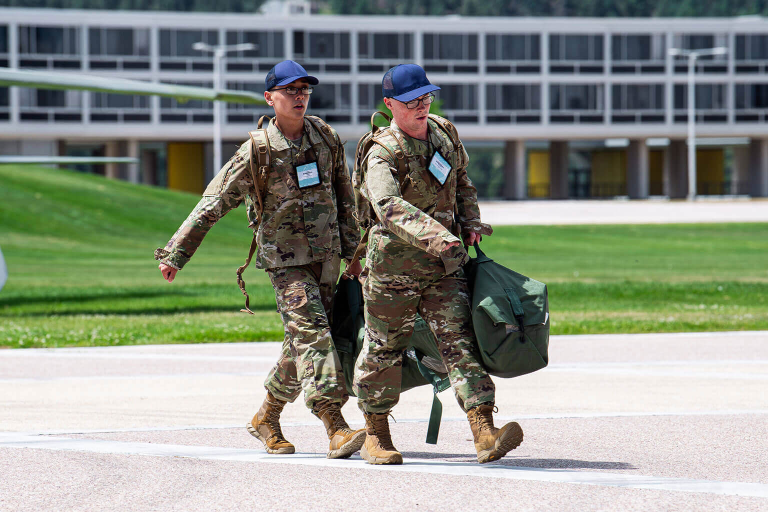 Basic Cadets wearing their assigned uniforms walking on the Terrazzo. Basic Cadets wearing their assigned uniforms walking on the Terrazzo.