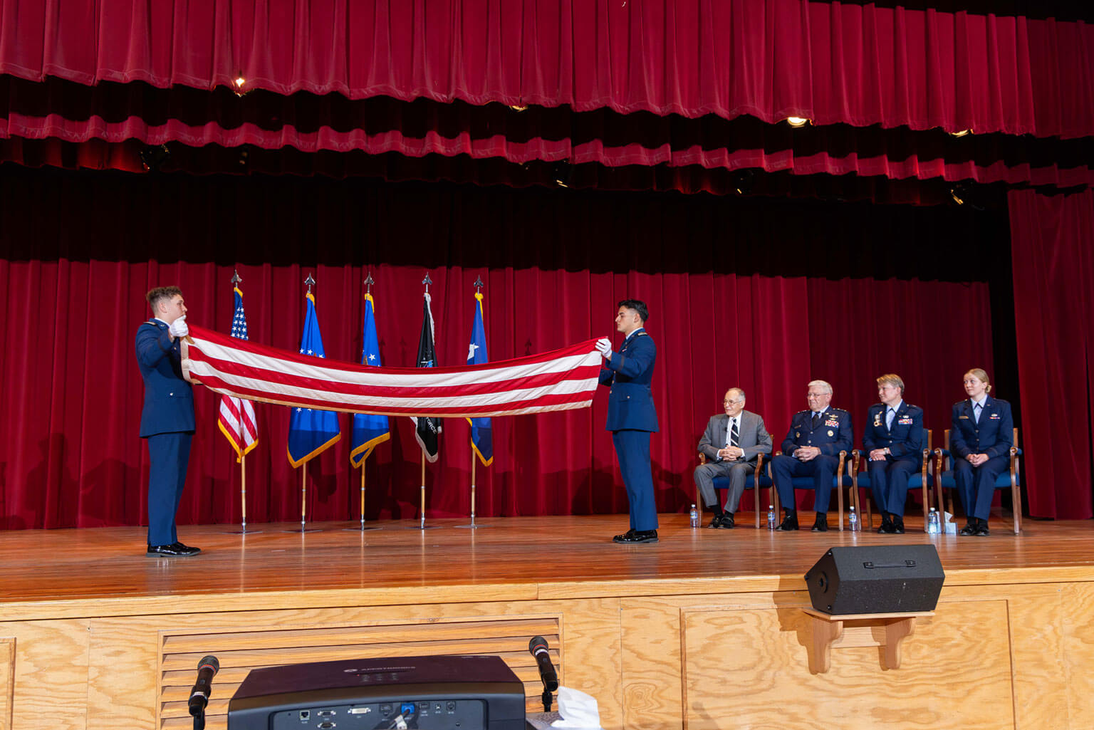 A flag is folded during Brig. Gen. Linell Letendre’s retirement ceremony at the U.S. Air Force Academy’s Fairchild Hall.
