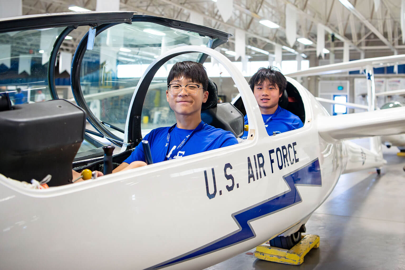 Rising high school seniors attending Summer Seminar sit in a glider at Davis Airfield, U.S. Air Force Academy, Colo., June 11, 2025. The weeklong program gives prospective candidates an opportunity to learn about the Academy's airmanship program and experience opportunities available to cadets. (U.S. Air Force photo by Dylan Smith)