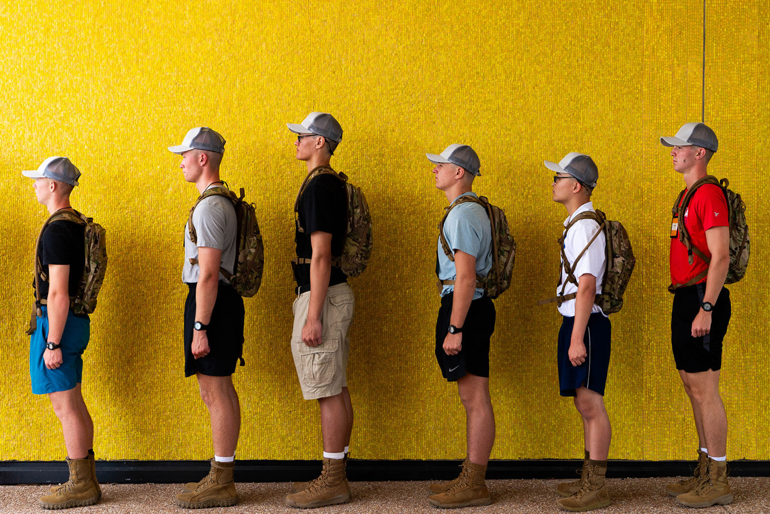 Basic cadets stand in a line in the cadet area. They are on their way to receive their uniforms. (U.S. Air Force photo by Trevor Cokley)