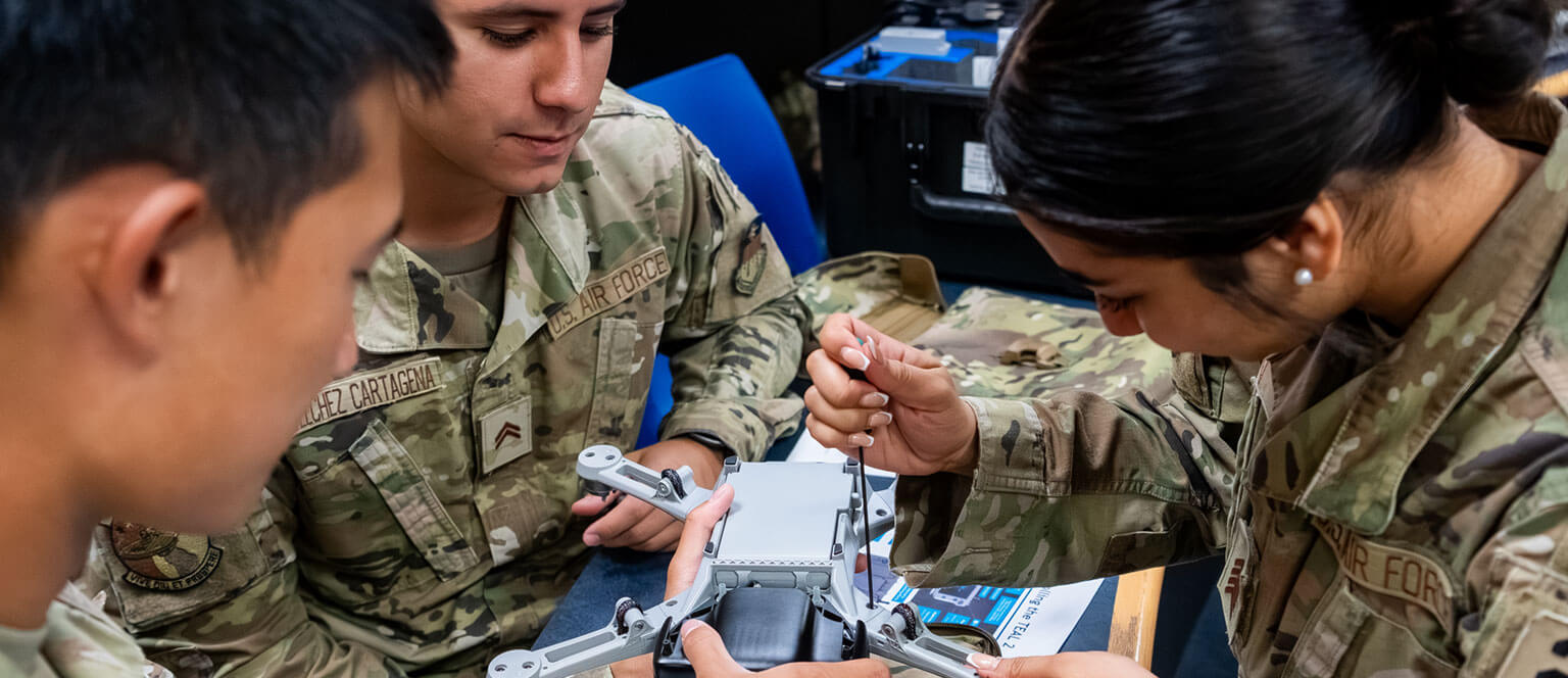 Cadets assembling a drone for use with future conflict scenarios.