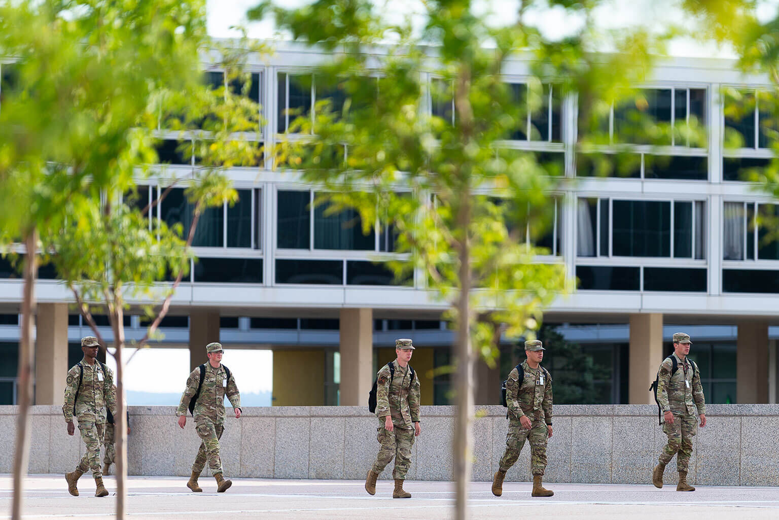 On the first day of class for the academic year, cadets walk across the Terrazzo at the U.S. Air Force Academy.