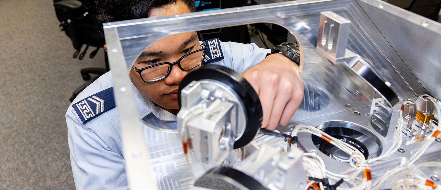 A cadet working with an atmospheric research project at the U.S. Air Force Academy.