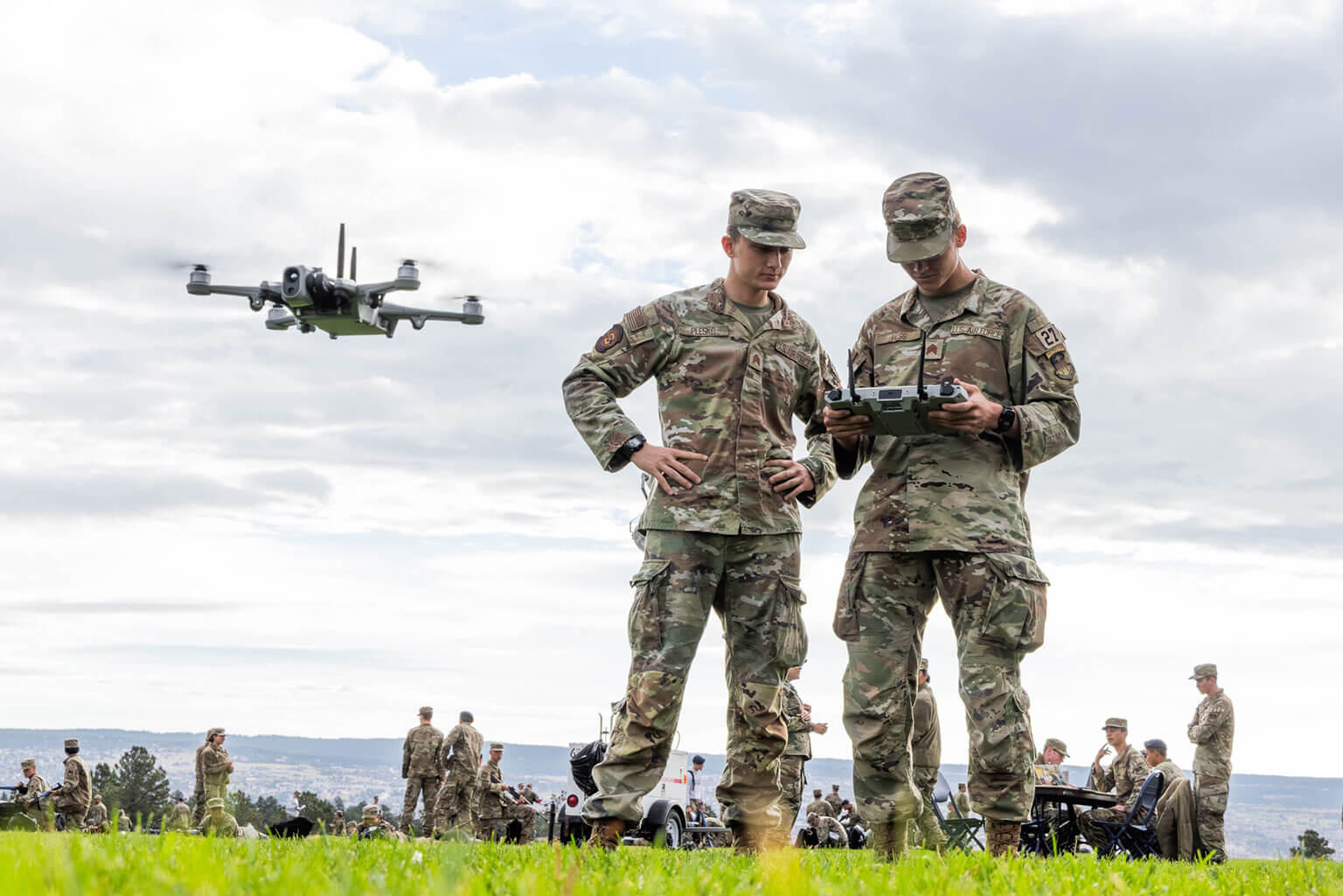 Cadets 2nd Class Luke Plesko and Owen Hess demonstrate the pilot and copilot role of the Teal 2 Small Unmanned Aircraft System during the Fall Validation Exercise, Stillman Field, U.S. Air Force Academy, Colo. Oct. 11, 2025. The two-day field exercise tests leadership, teamwork and warrior ethos. (U.S. Air Force photo by Trevor Cokley)