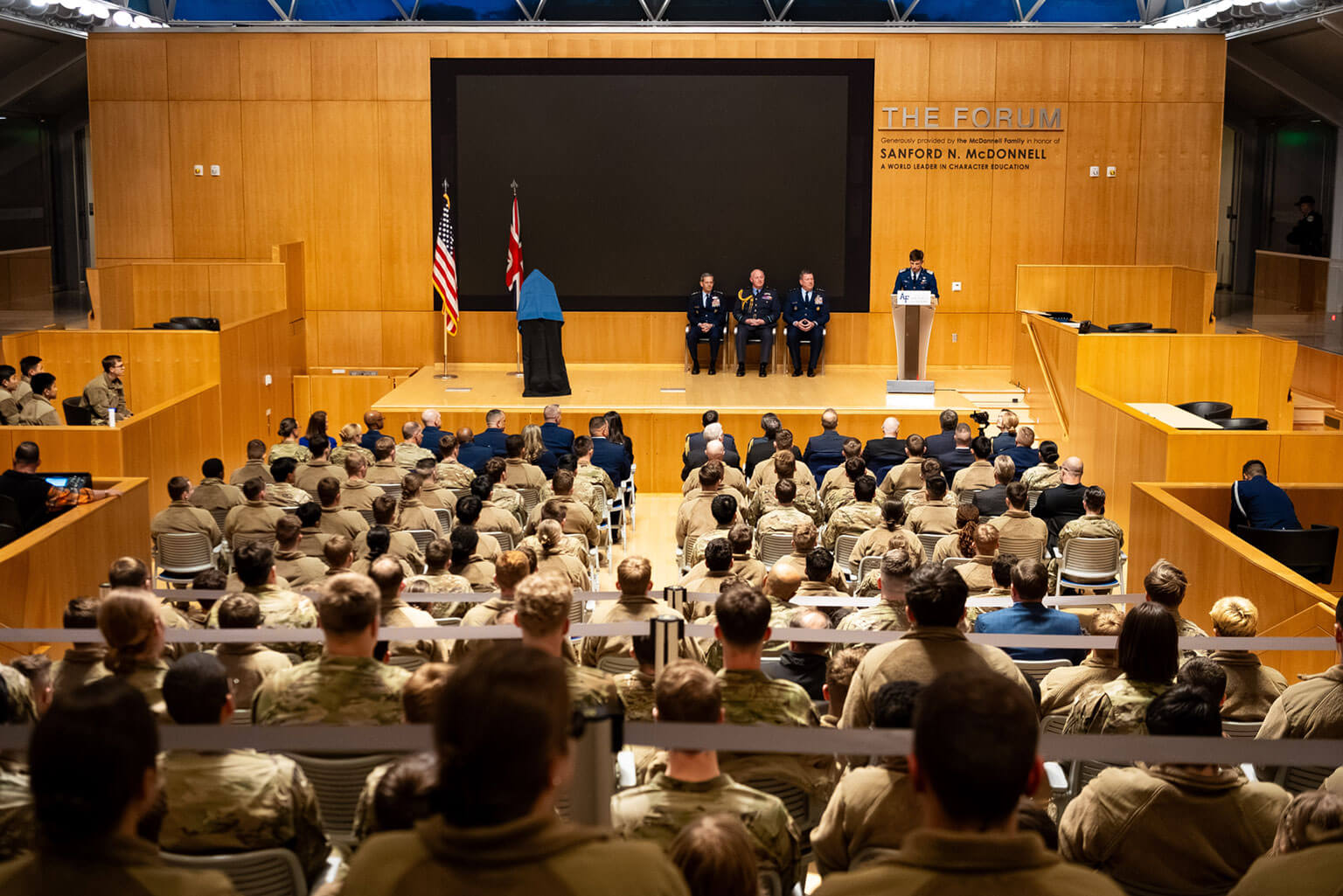U.S. Air Force Cadet 1st Class Jack Marsh, moderates the plaque ceremony commemorating the Battle of Britain in Polaris Hall at the U.S. Air Force Academy, Colo., on Jan. 16, 2026. The commemoration of the battle emphasized that Airmen, when called upon, must be ready to answer. (U.S. Air Force photo by Ray Bahner)