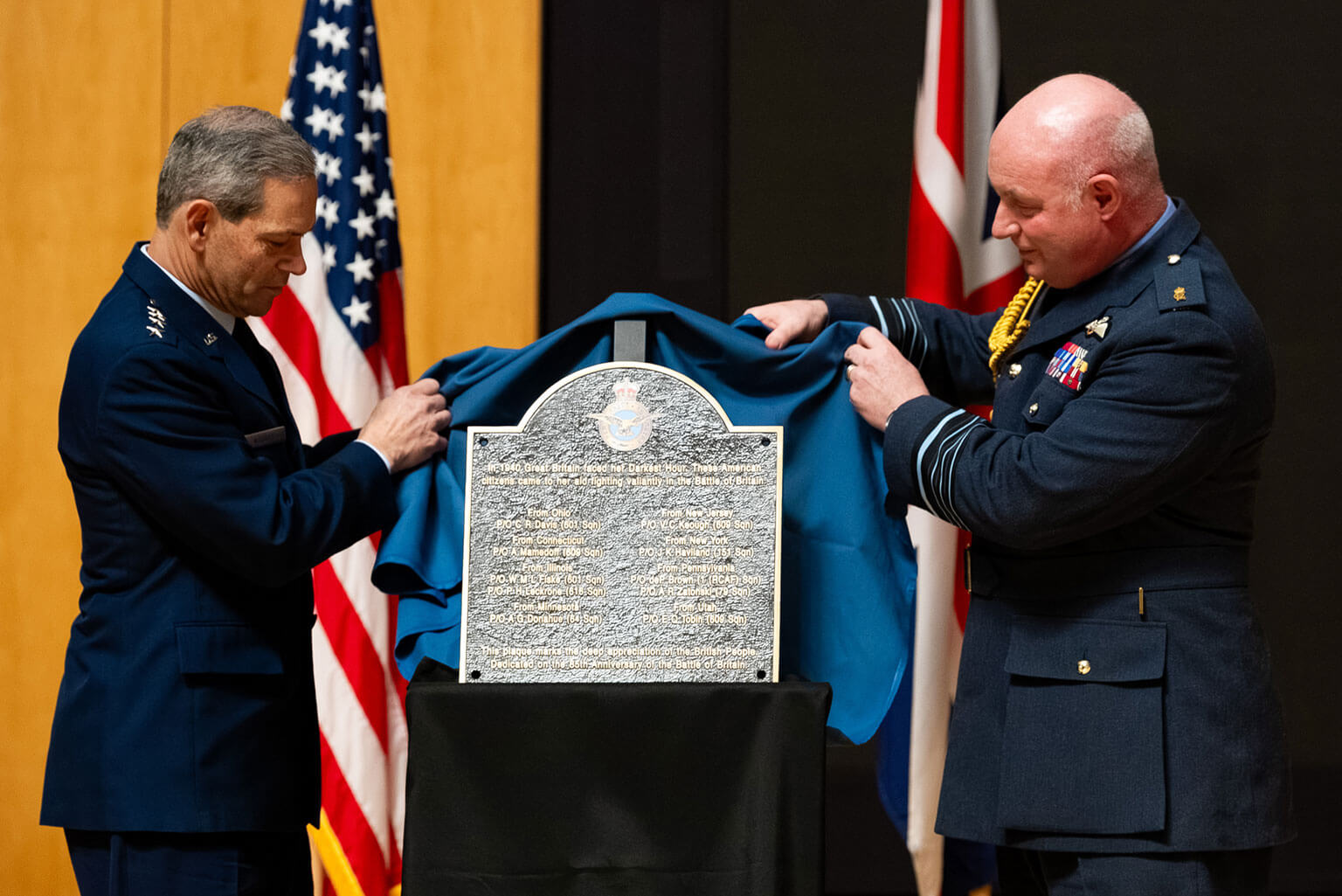 U.S Air Force Chief of Staff Gen. Ken Wilsbach, left, and Air Chief Marshal Sir Harvey Smyth, Royal Air Force Chief of the Air Staff, right, unveils the Battle of Britain plaque in Polaris Hall at the U.S. Air Force Academy, Colo., on Jan. 16, 2026. The plaque ceremony commemorated the 85th anniversary of the battle and honored the enduring partnership between the RAF and the U.S. Army Air Forces during World War II. (U.S. Air Force photo by Ray Bahner)