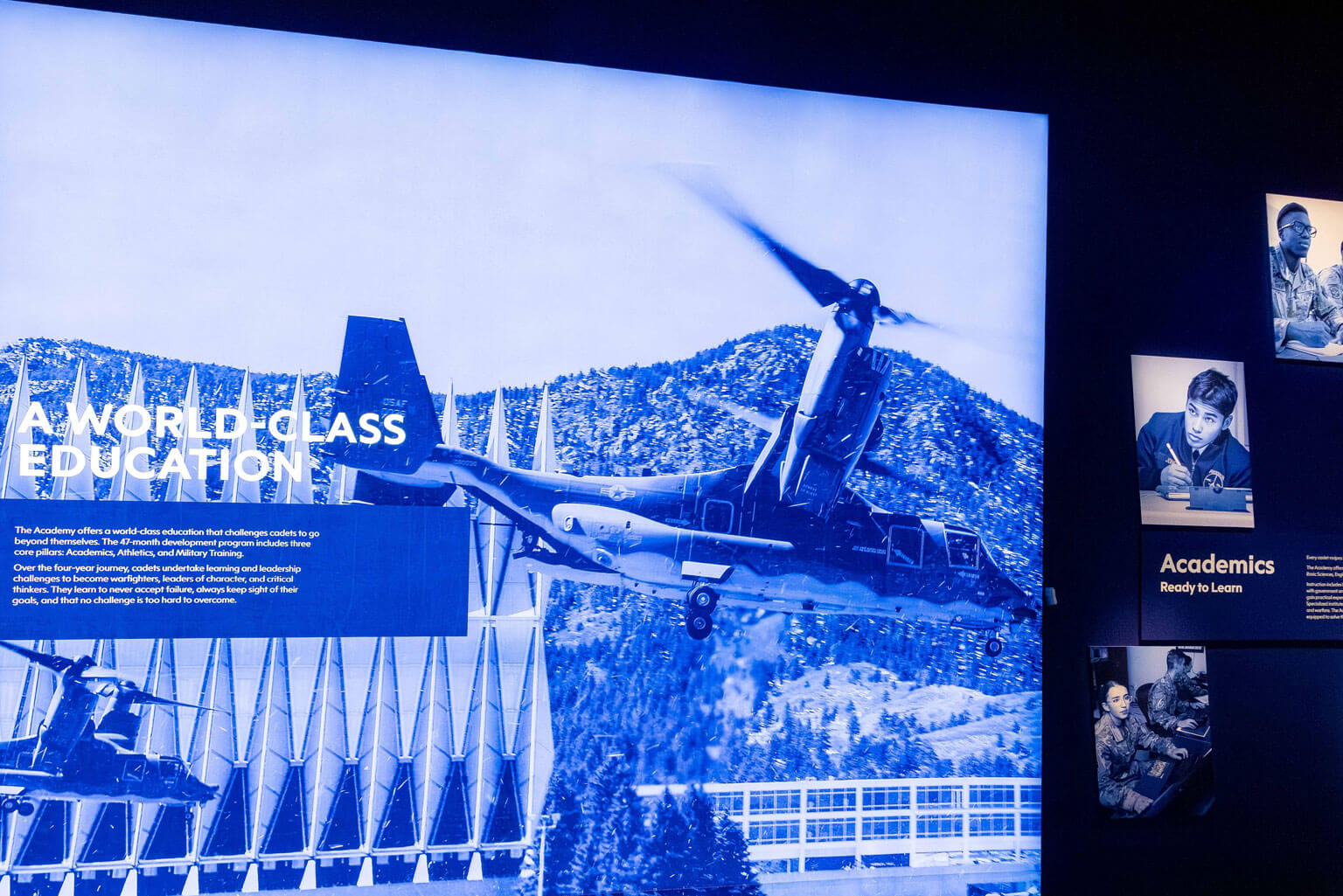 A CV-22 Osprey ascends in front of the cadet chapel, illustrating military and helicopter-related information.