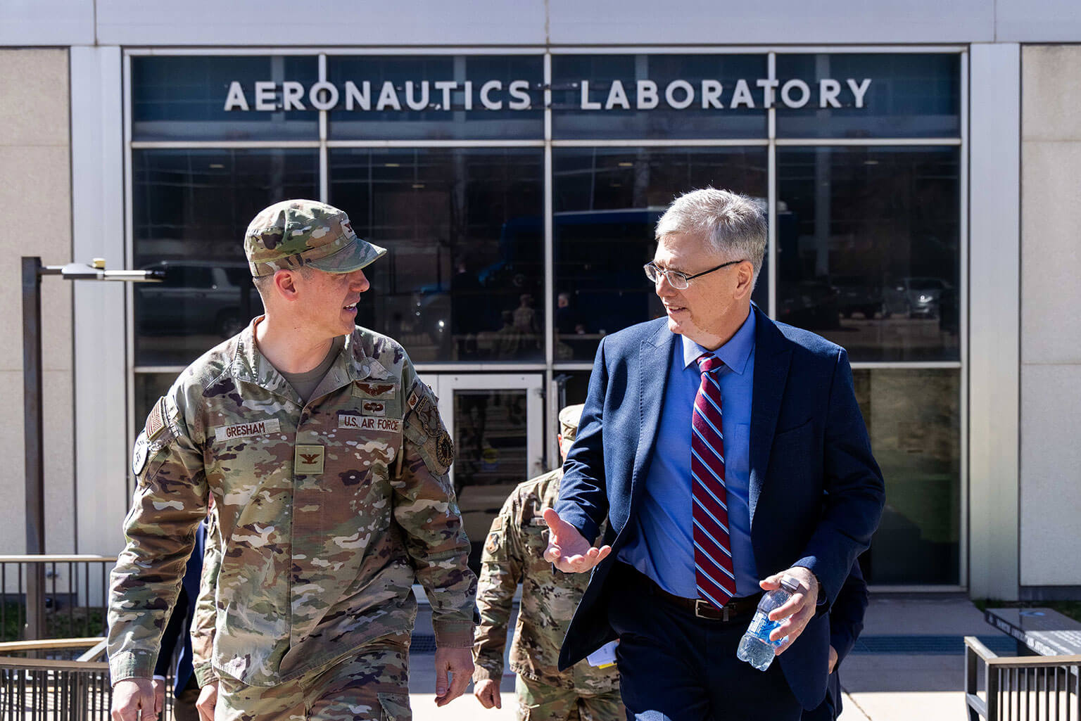 Col. James Gresham, a U.S. Air Force Academy department head, left, discusses a research project with Secretary of the Air Force Troy Meink at the Aeronautics Laboratory, U.S. Air Force Academy, Colo., April 13, 2026. The tour highlighted how the Academy’s cutting-edge undergraduate research contributes to the Department of the Air Force’s modernization priorities. (U.S. Air Force photo by Trevor Cokley)