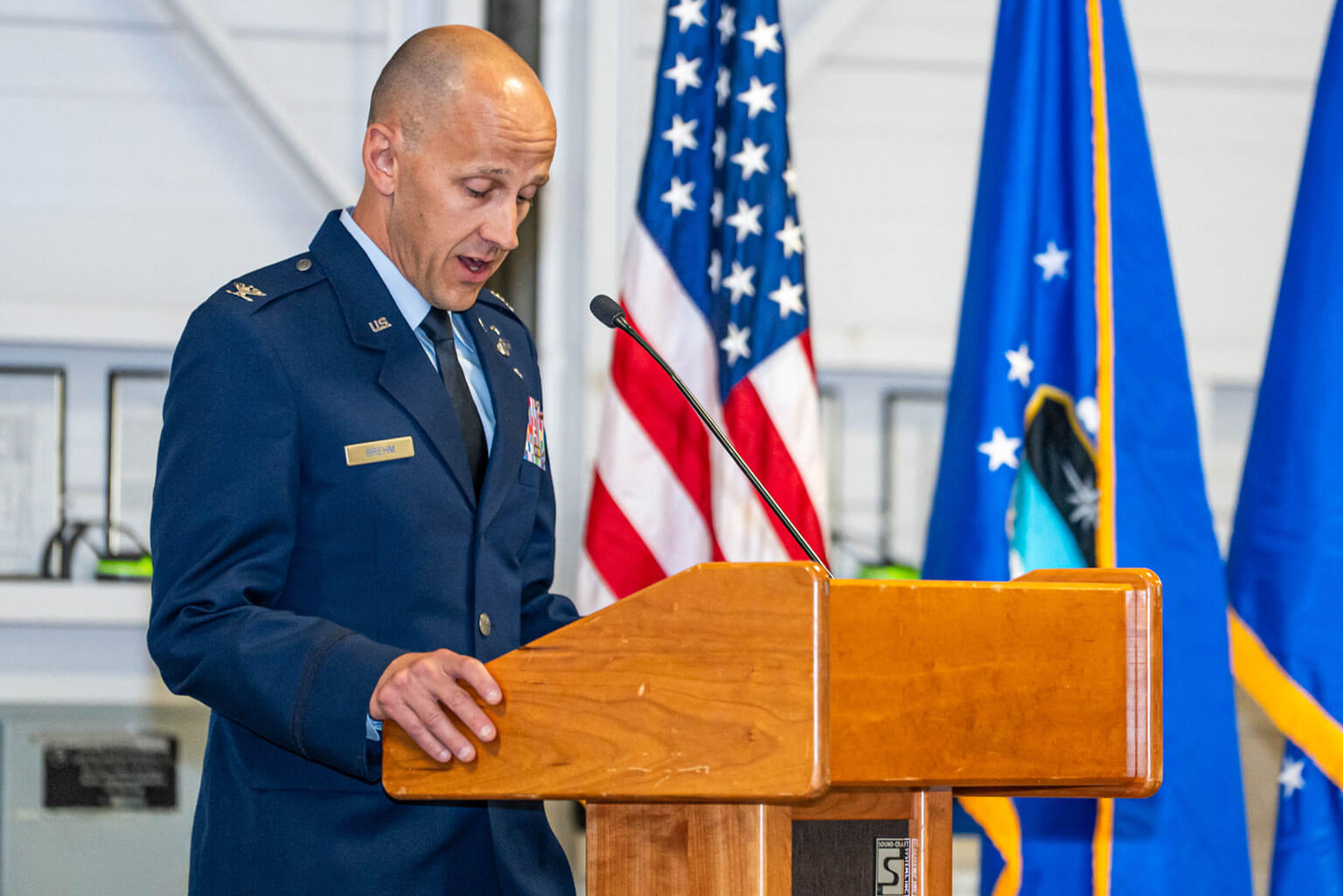Col. Paul J. Brehm addresses attendees during the 306th Flying Training Group change of command ceremony at Davis Airfield, U.S. Air Force Academy, Colo., June 3, 2026. The 306th Flying Training Group change of command marked the transfer of leadership for the unit that provides cadet soaring, powered flight and parachute training. (U.S. Air Force photo by Jonathan Suni)