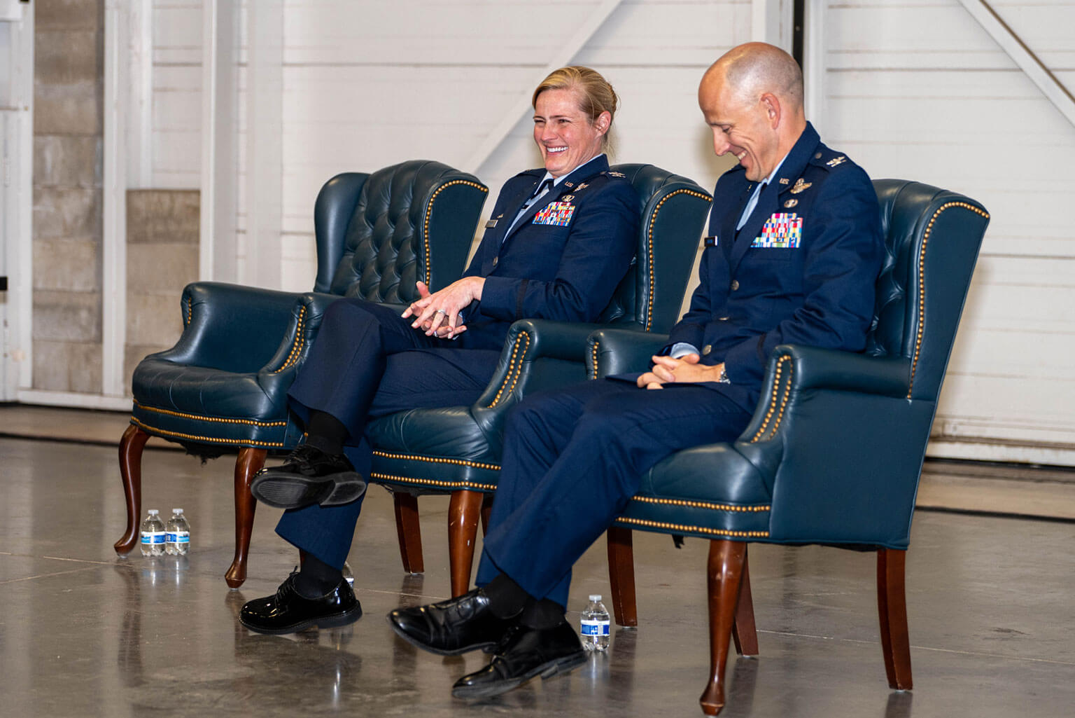 Col. Nancy E. Taylor and Col. Paul J. Brehm share a moment during the 306th Flying Training Group change of command ceremony at Davis Airfield, U.S. Air Force Academy, Colo., June 3, 2026. During the 306th Flying Training Group change of command, Brehm assumed responsibility for leading the Academy's cadet airmanship programs and flying training operations. (U.S. Air Force photo by Jonathan Suni)