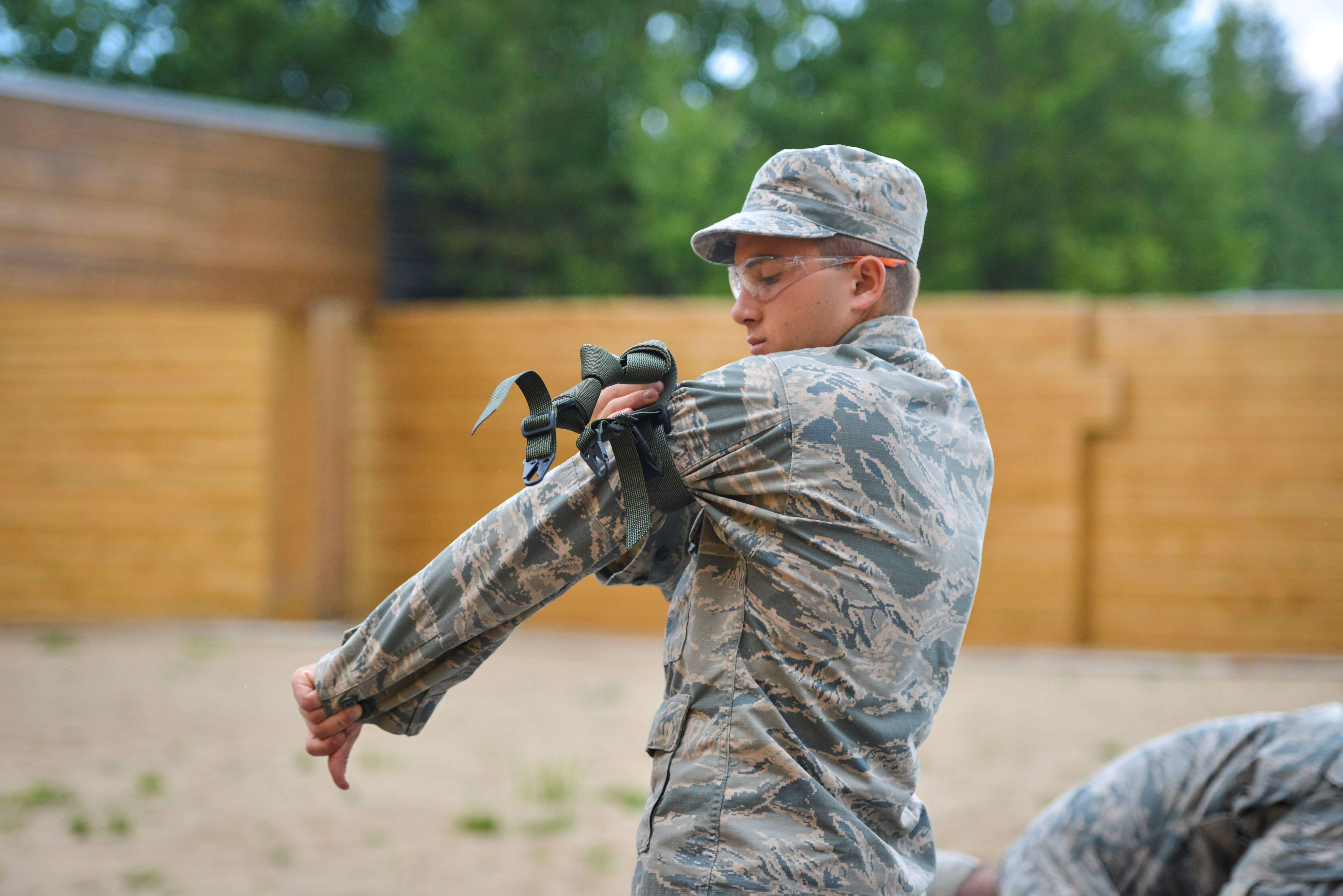 Cadet preparing sling for marksmanship competition
