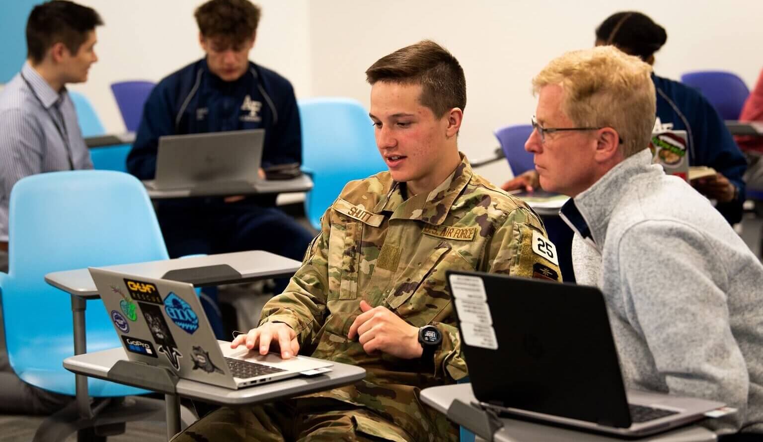 Cadets using laptop computer in Academic Success Center