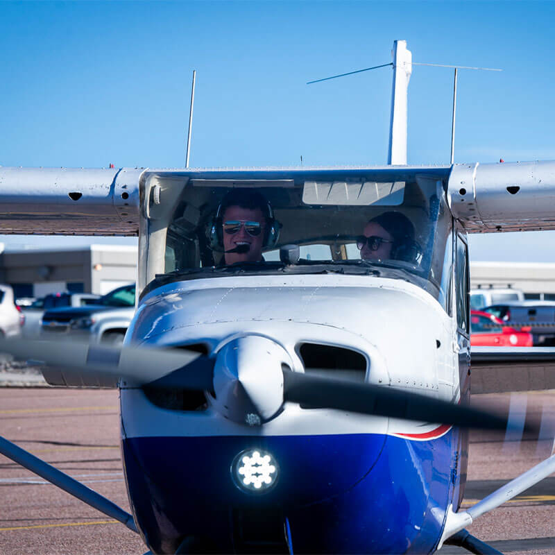 Cadet and instructor in a powered training and orientation flight.