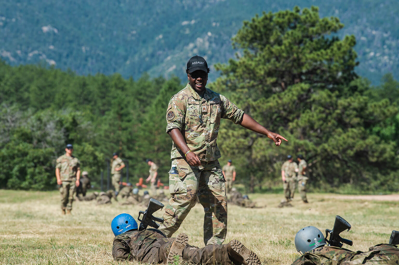 U.S. Air Force Academy Cadet 2nd Class Osaro Aihie teaches assault course procedures 