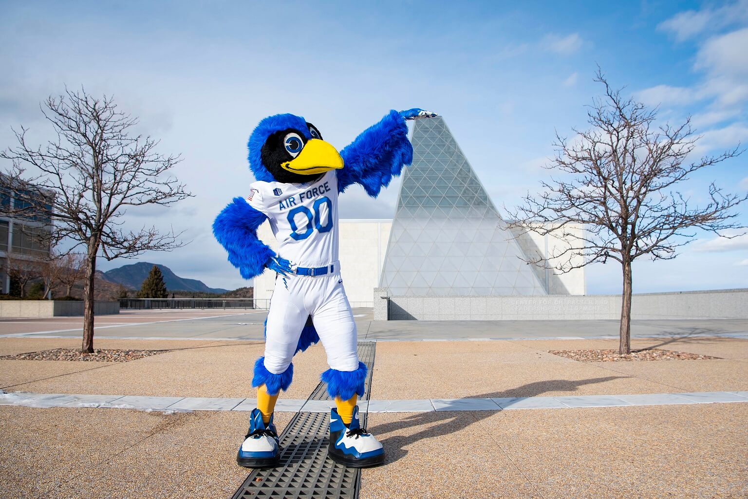 Falcon mascot in front of Polaris Hall