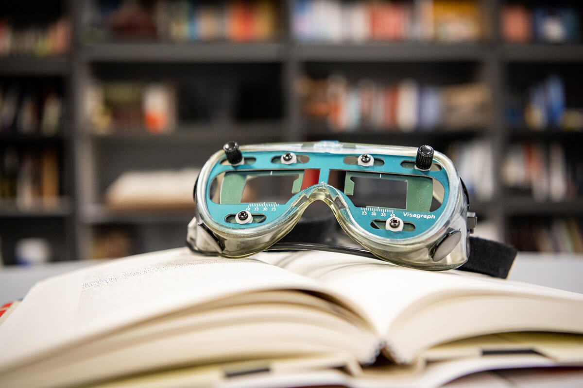 goggles and book