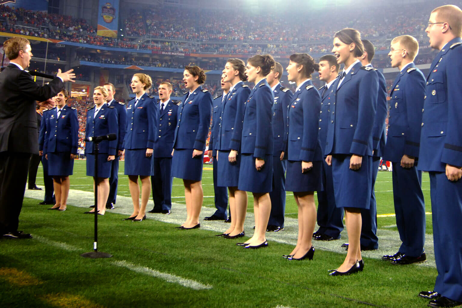 The Cadet Chorale performing for a crowd.