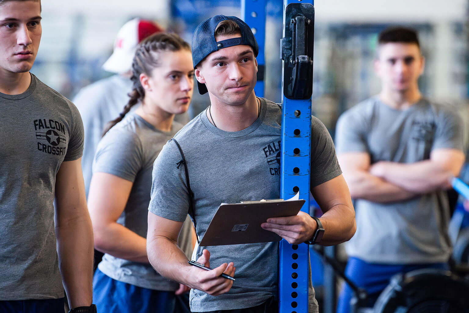 A cadet takes down stats while training for the Falcon CrossFit Club.