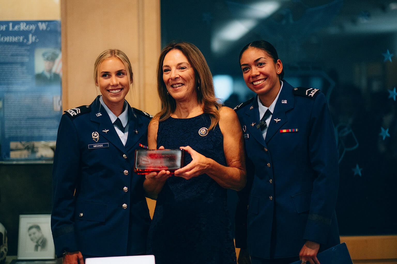 U.S. Air Force Academy Cadet 3rd Class Lauren Mirande and Cadet 3rd Class Jocelynn Stevenson greet Valerie Nessel