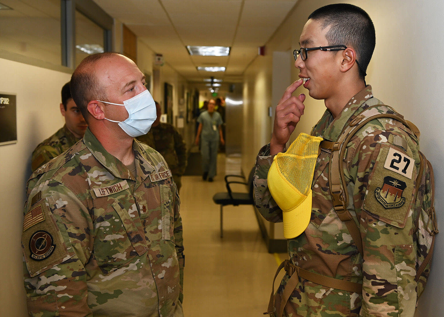 Maj. Greyson Leftwich, 10th Medical Group dentist, evaluates a basic cadet 