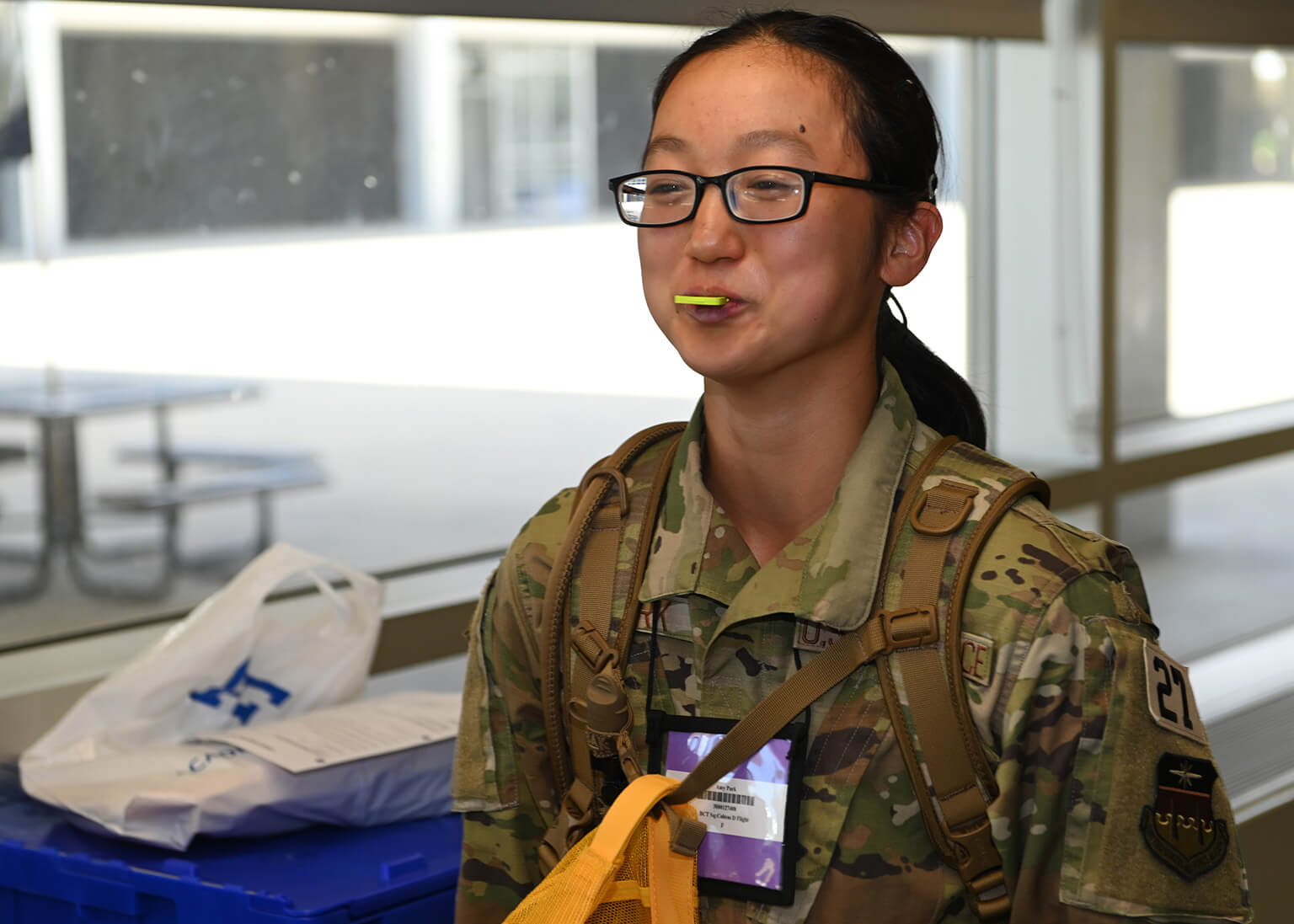 A basic cadet bites down on a mouth guard