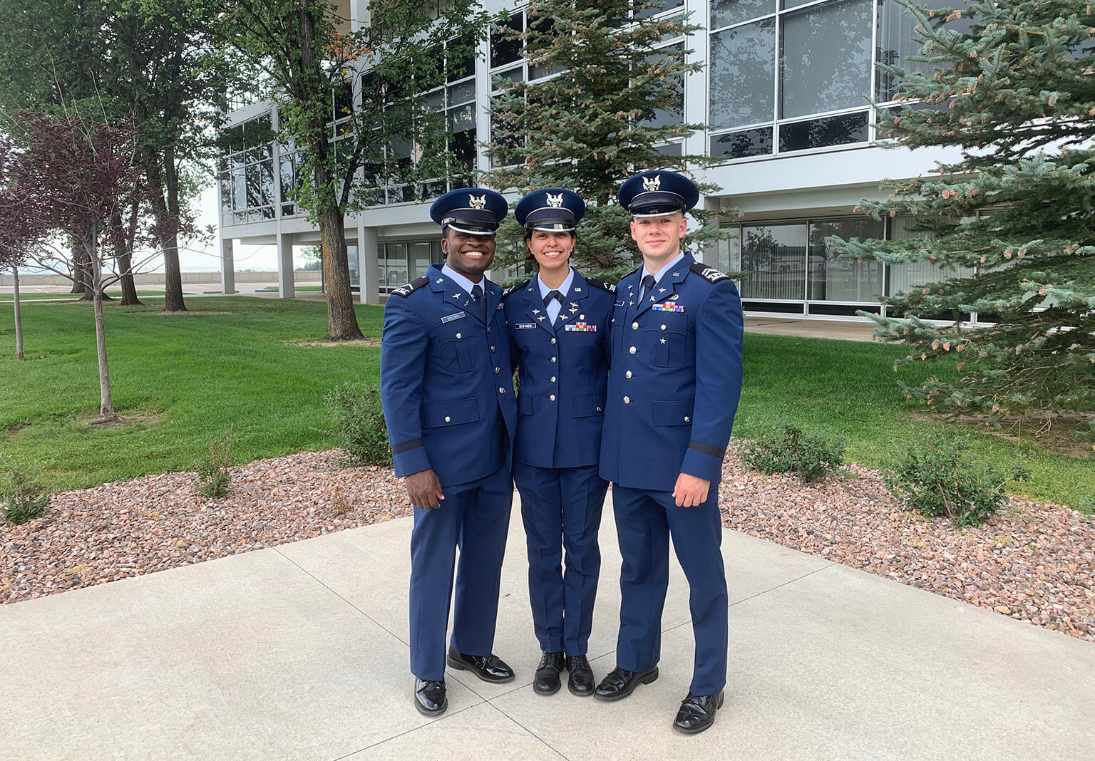 2nd Lt. Lendel Brown, pictured here as a U.S. Air Force Academy cadet third class on Recognition Aug. 15, 2020, poses with fellow cadets Shakira Colon-Madera and Jonathan Godwin. 