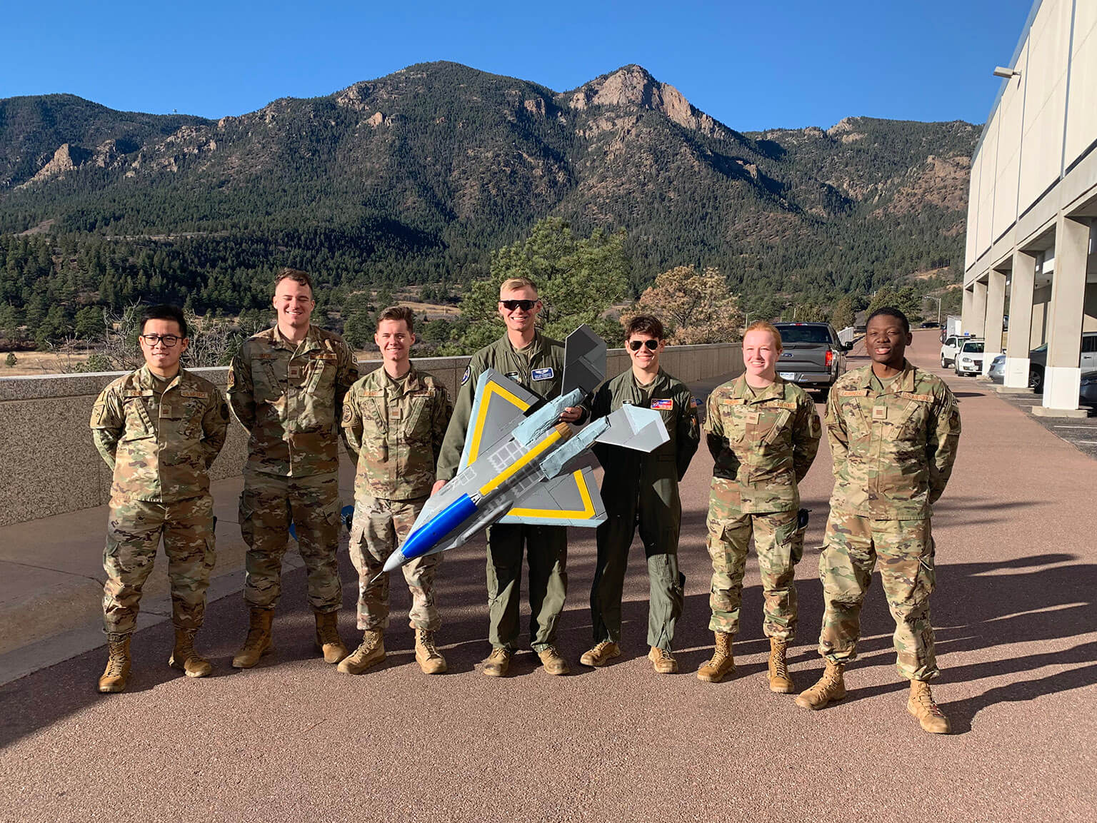 Cadets 1st Class Bryce Helmer (from left), Kevin Sanchez, Sam Widman, Nathan Uhl and Stephen Zanowic pose with their team’s flying model of their large stealthy target drone 
