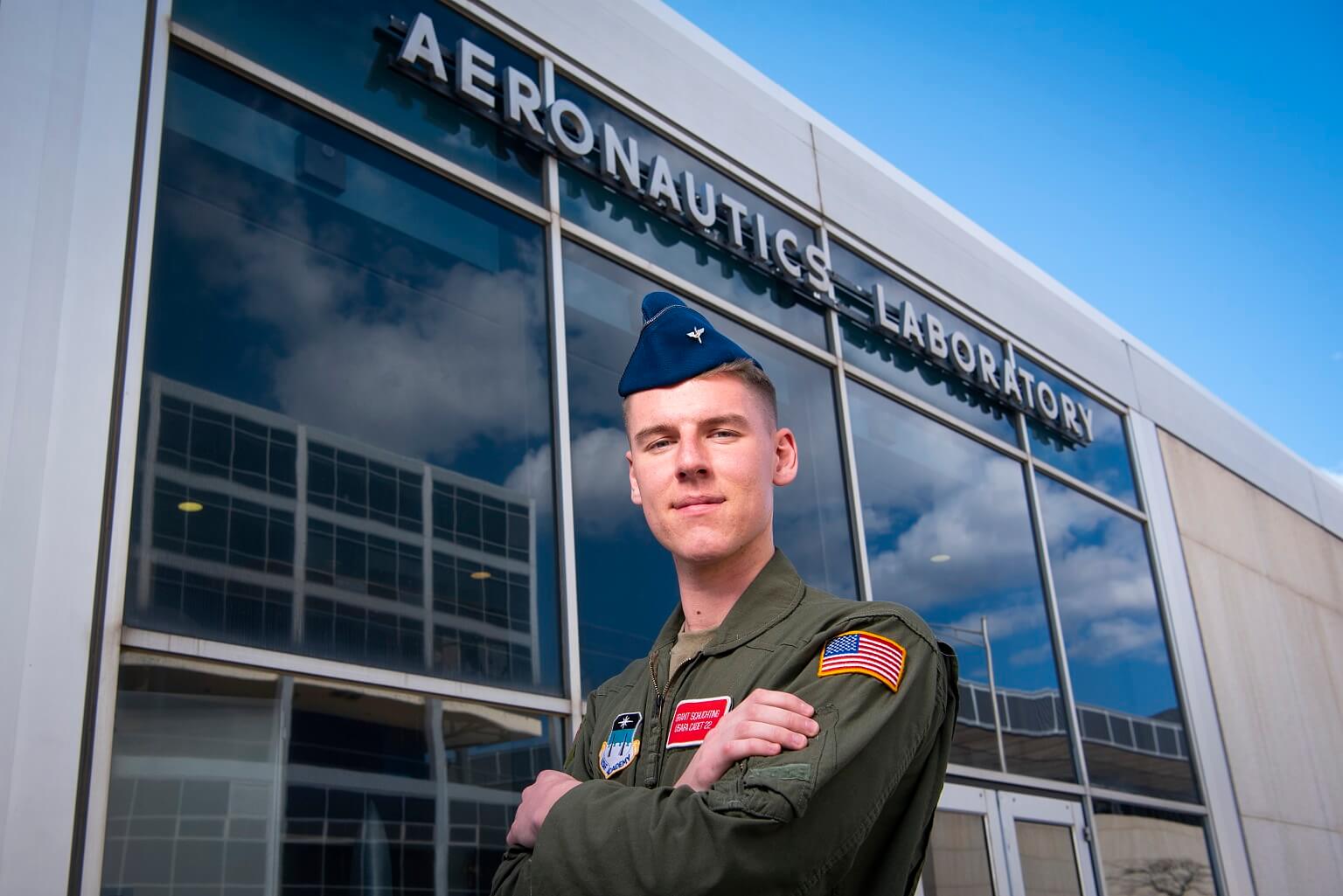 Cadet Schlichting stands in front of the United States Air Force Academy’s aeronautics laboratory