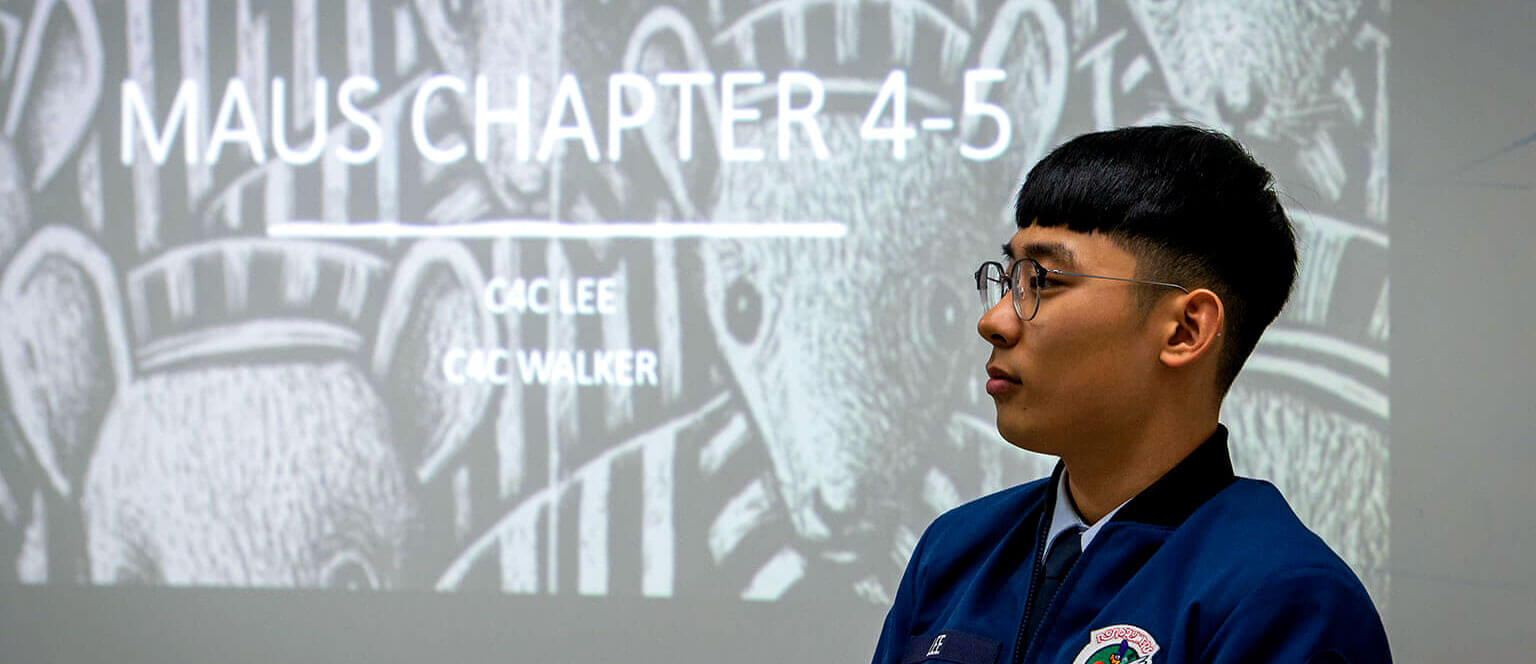 cadet looking up in library atrium