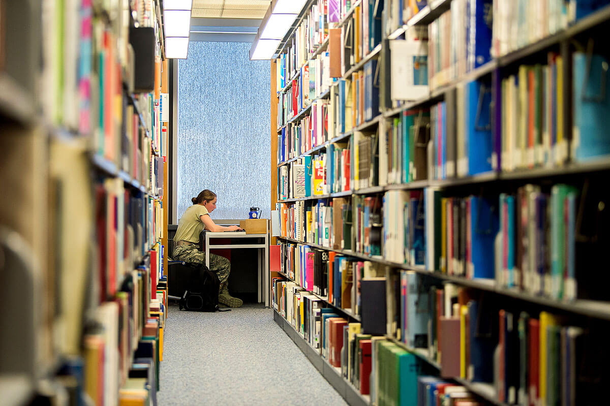Cadet in library