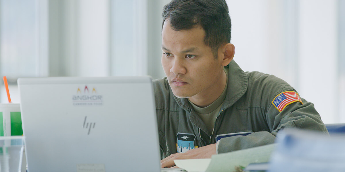 Image of cadet studying.