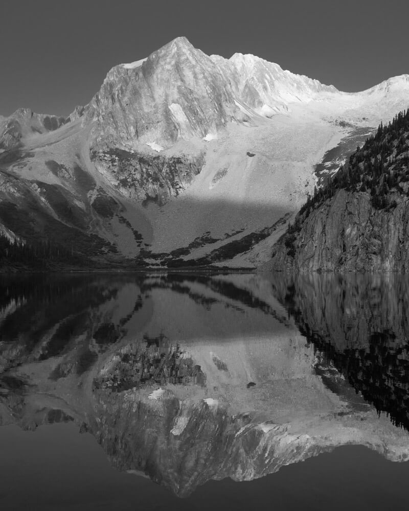 mountain with lake in foreground