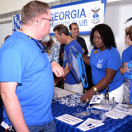 Booth at the Parents' Weekend information fair.