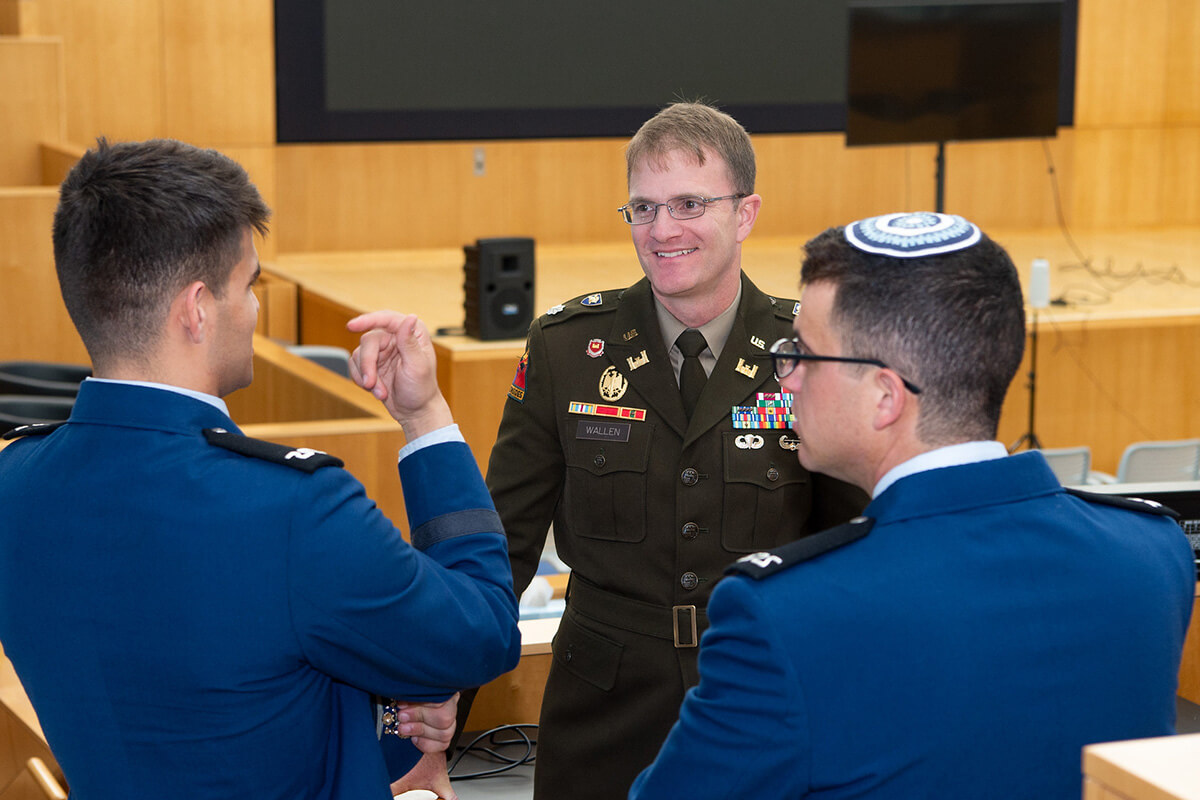 Cadets talk to a presenter at the Jewish Warrior Weekend.