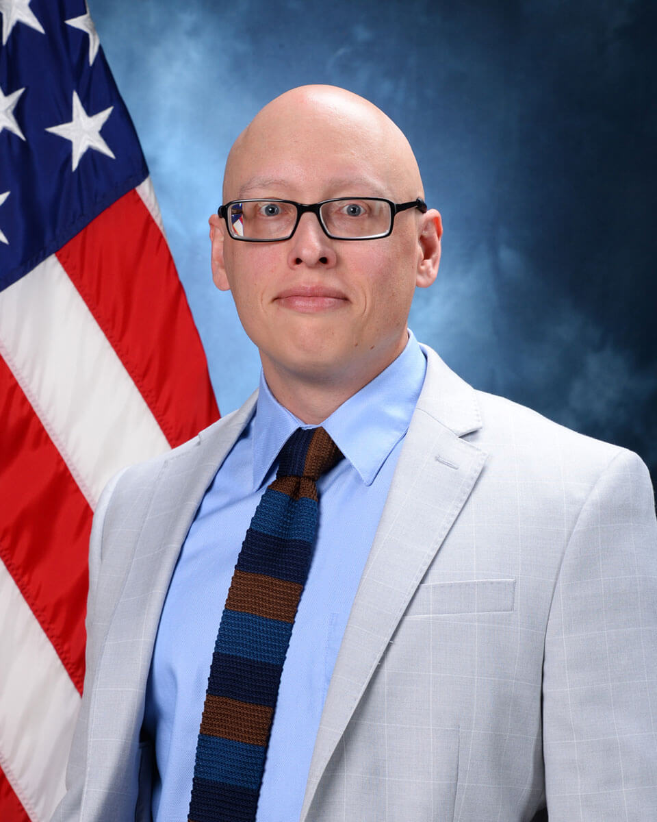 Dr. Justin Simundson