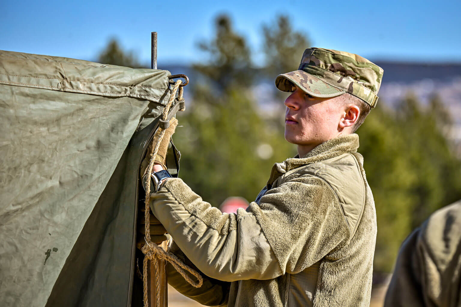 Cadet Candidate Ryan Howlett helps build a tactical operations center during a Silver Saturday training exercise, at the U.S. Air Force Academy Preparatory School, Colorado, Jan. 31, 2026. Silver Saturday is a quarterly training weekend at the U.S. Air Force Academy Preparatory School that reinforces military skills, teamwork and leadership development for cadet candidates. (U.S. Air Force Photo by C/C Madison Harte)
