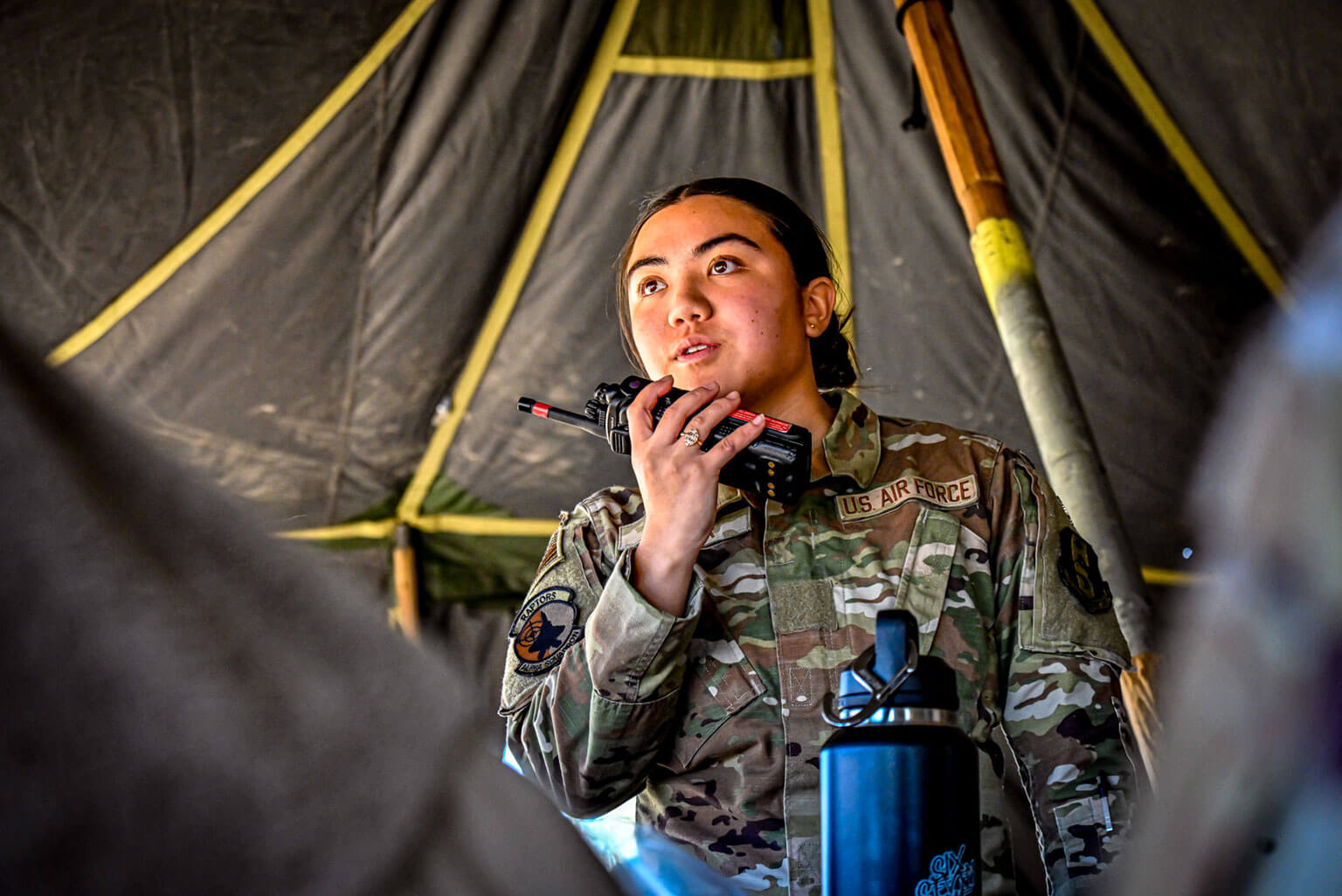 Cadet Candidate Harley Yatar relays critical updates via radio during a Silver Saturday training exercise, at the U.S. Air Force Academy Preparatory School, Colorado, Jan. 31, 2026. The radio communications training aimed to keep the operation synced and responsive (U.S. Air Force Photo by C/C Madison Harte)