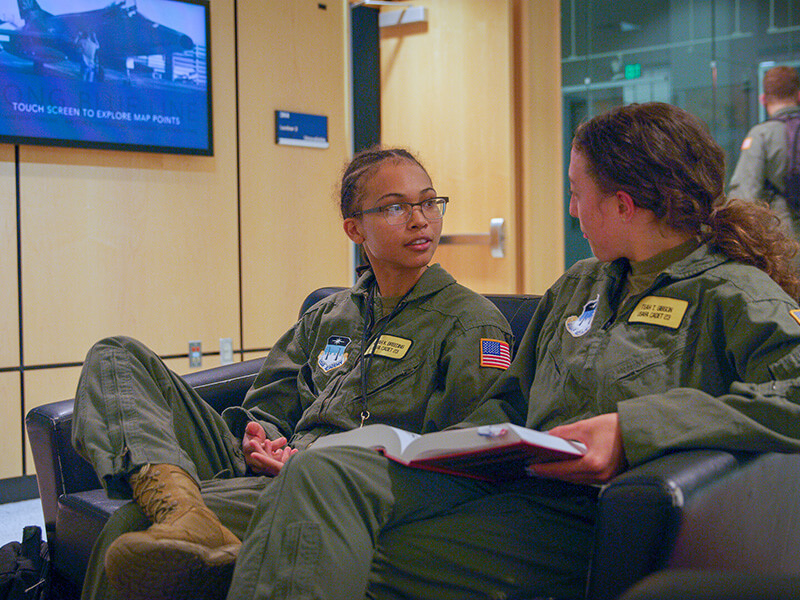Image of cadets talking to each other.