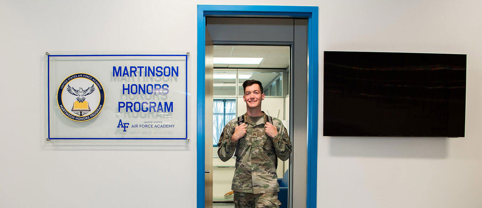 Cadet walking out of Martinson Honors Program office