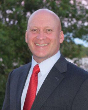 Official photo of Dr. Chris Luedtke (CCLD).