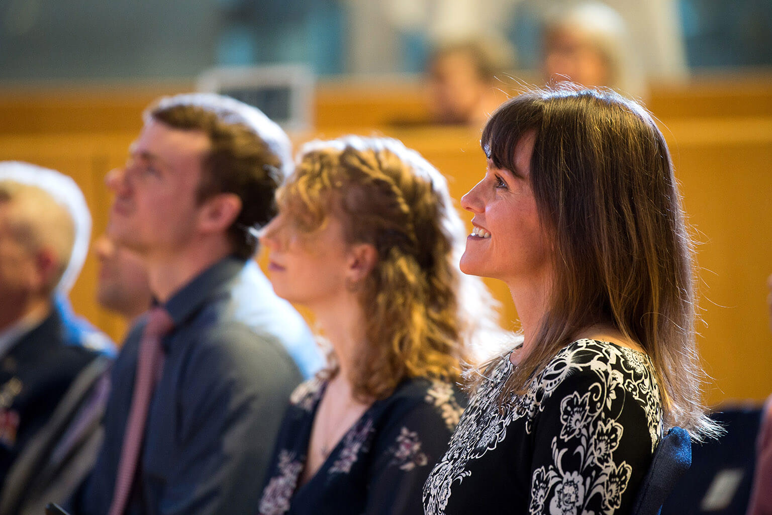 parents listening in crowd