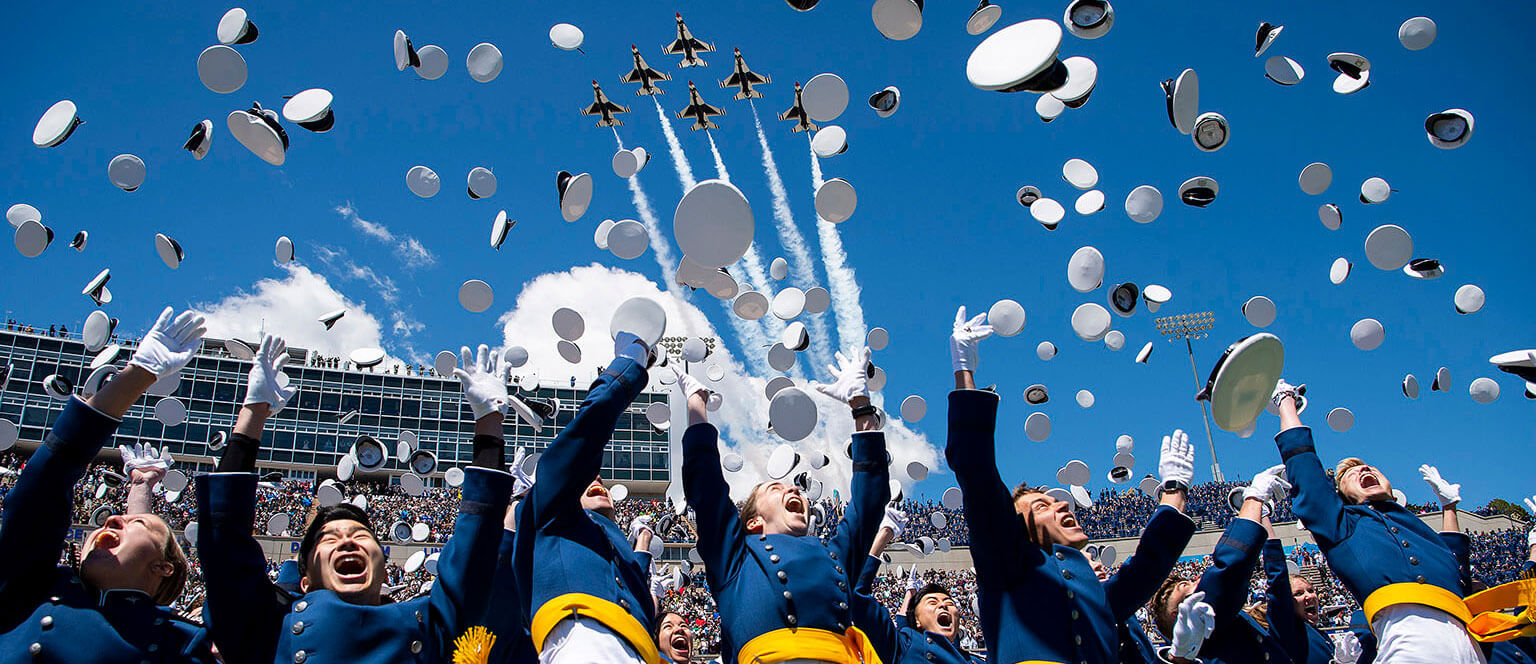 Cadets tossing hats at graduation